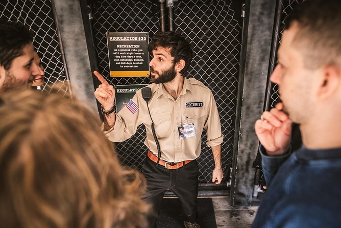 Alcotraz Prison Cocktail Experience in London - Pulling on the orange jumpsuit