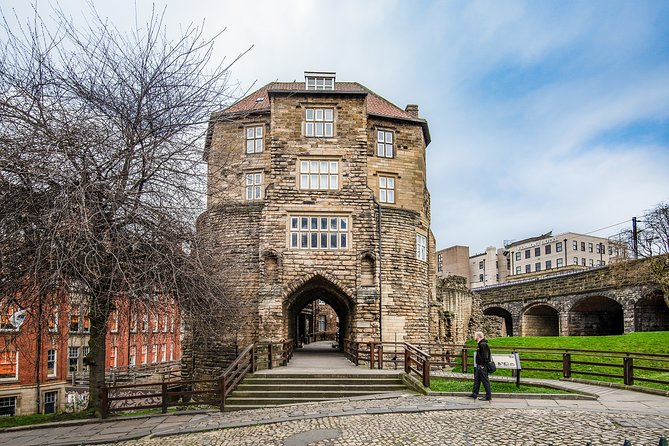 Annual Admission Newcastle Castle Ticket - Two medieval buildings with a railway between them