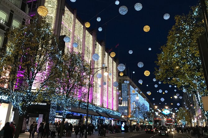 Christmas Lights Open-Top Bus Tour - Piccadilly Circus, Eros, and the neon glow