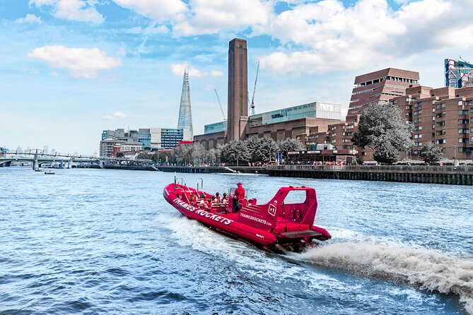 High-Speed Thames River Speedboat in London - Tower Bridge and the former battleship