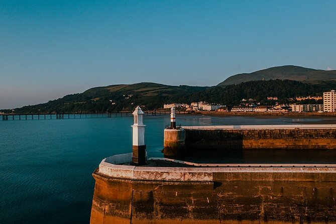 Isle of Man Discovery Tour with experienced Driver Guide - Peel adds a castle, fishing harbour, and wildlife