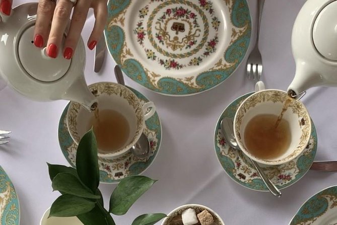 Kensington Palace VIP Garden Tour with Royal High Tea - Afternoon tea inside the palace grounds