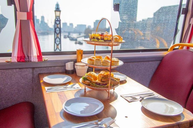 London Afternoon Tea Bus and Panoramic Tour on Lower Deck - Lower Deck Views, Shared Tables, and Practical Comfort