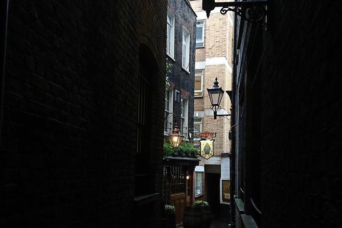 London Christmas Carol & Charles Dickens Small Group Walking Tour - The Royal Exchange and Scrooge’s darker vision