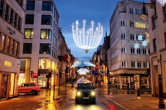 London Christmas Lights Guided Tour by Cab - Bond Street: polished lights and luxury windows