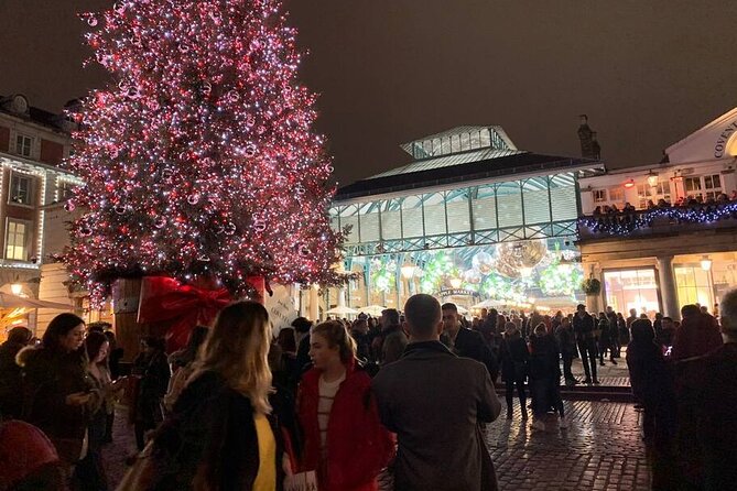 London Christmas Lights Guided Walking Tour - Starting under Covent Garden’s festive canopy