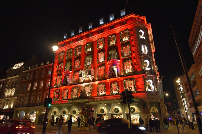 London Christmas Lights Private Walking Tour - The Strand adds grand hotels and old money