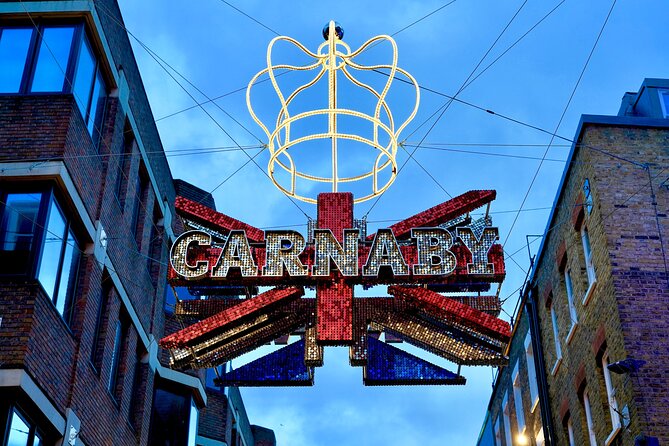 London Exclusive Christmas Lights Guided Tour by Black Cab - Bond Street: polished displays and luxury windows