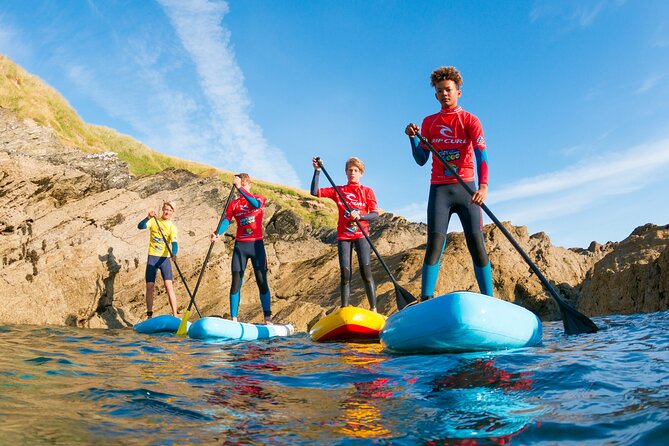 Paddleboarding Around Newquay's Coastline - Learning the basics before leaving shore