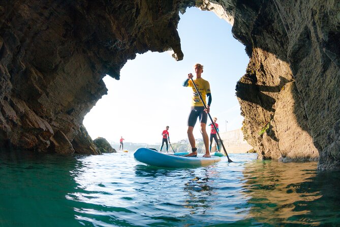 Paddleboarding Around Newquay's Coastline - Launching from a sheltered section of coastline