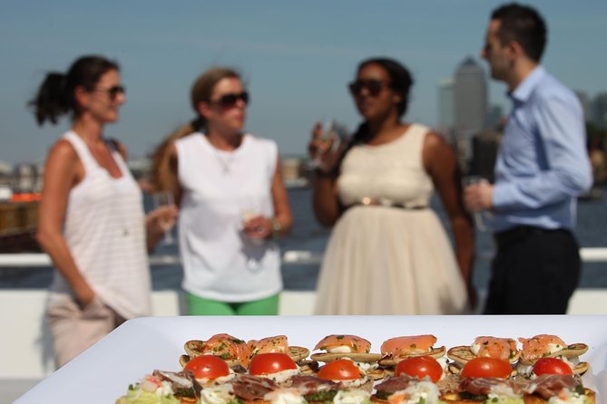River Thames Evening Cruise with Sparkling wine and Canapés - The London Eye and Shakespeare’s Globe