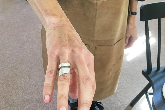 Silver Ring Workshop in Kent, England - Filing, buffing, and polishing the finished piece