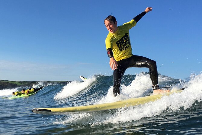 Taster Surfing Lesson in Bude - Entering the water at Widemouth Bay