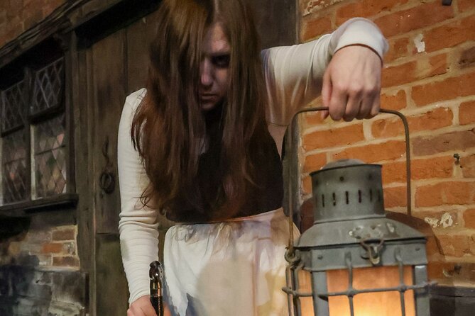 Tudor World Ghost Tour by Lantern light inside the building - Entering Tudor World after the doors close