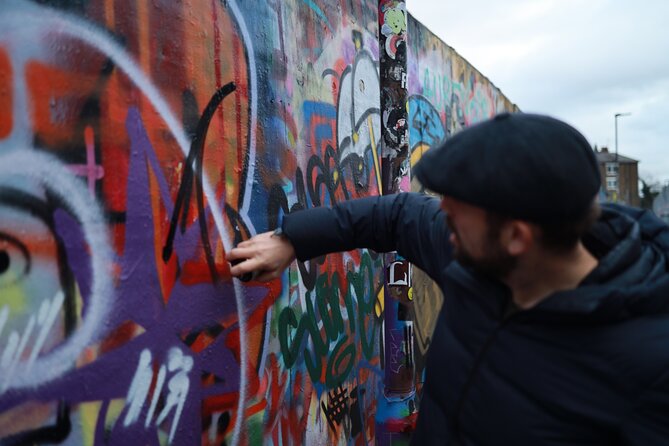Urban Canvas: Exploring Shoreditch's Vibrant Street Art - The spray-painting activity